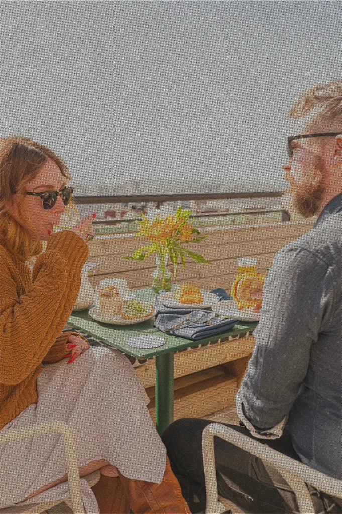 two people having breakfast at the rooftop caffe