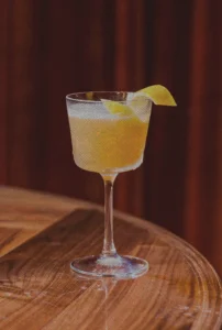 a cocktail in red ribbon society