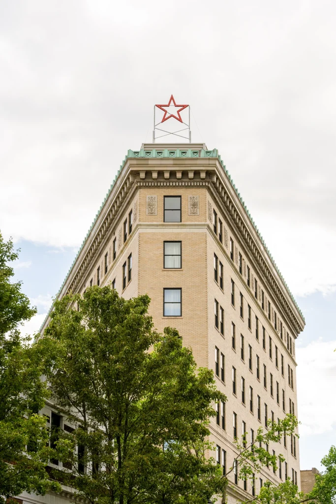 street view of the star at the top of the Flat Iron Hotel