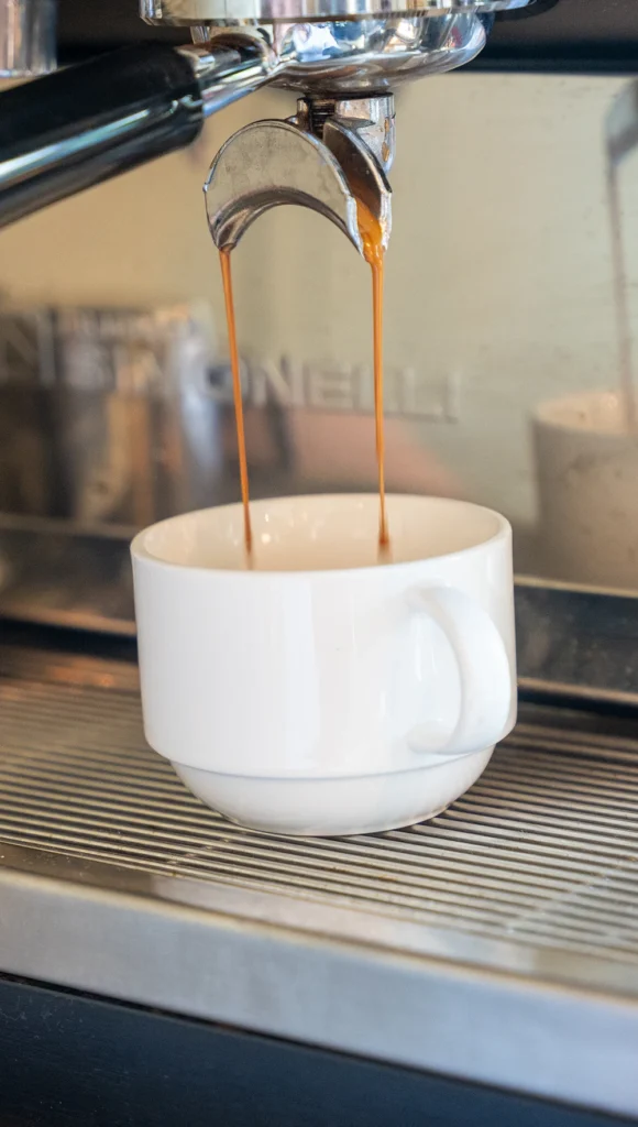 coffee being poured at the rooftop caffe in the flat iron hotel