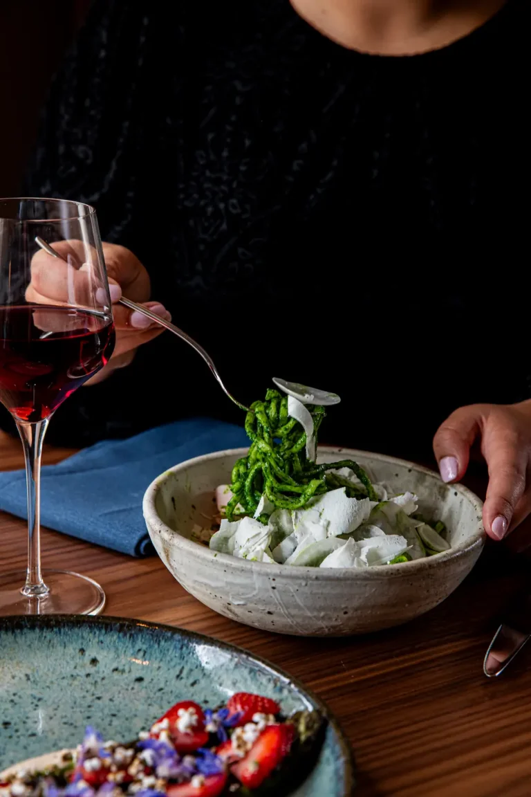 a green pasta dish from the luminosa menu at the flat iron hotel