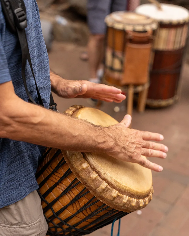 a man plays a drum