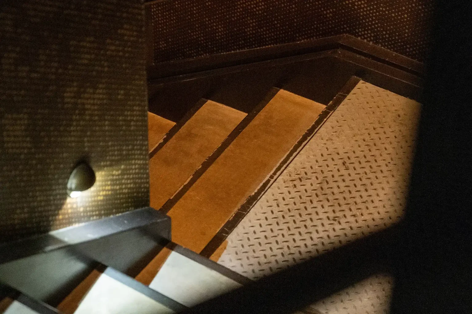 stairs to the red ribbon society at the flat iron hotel