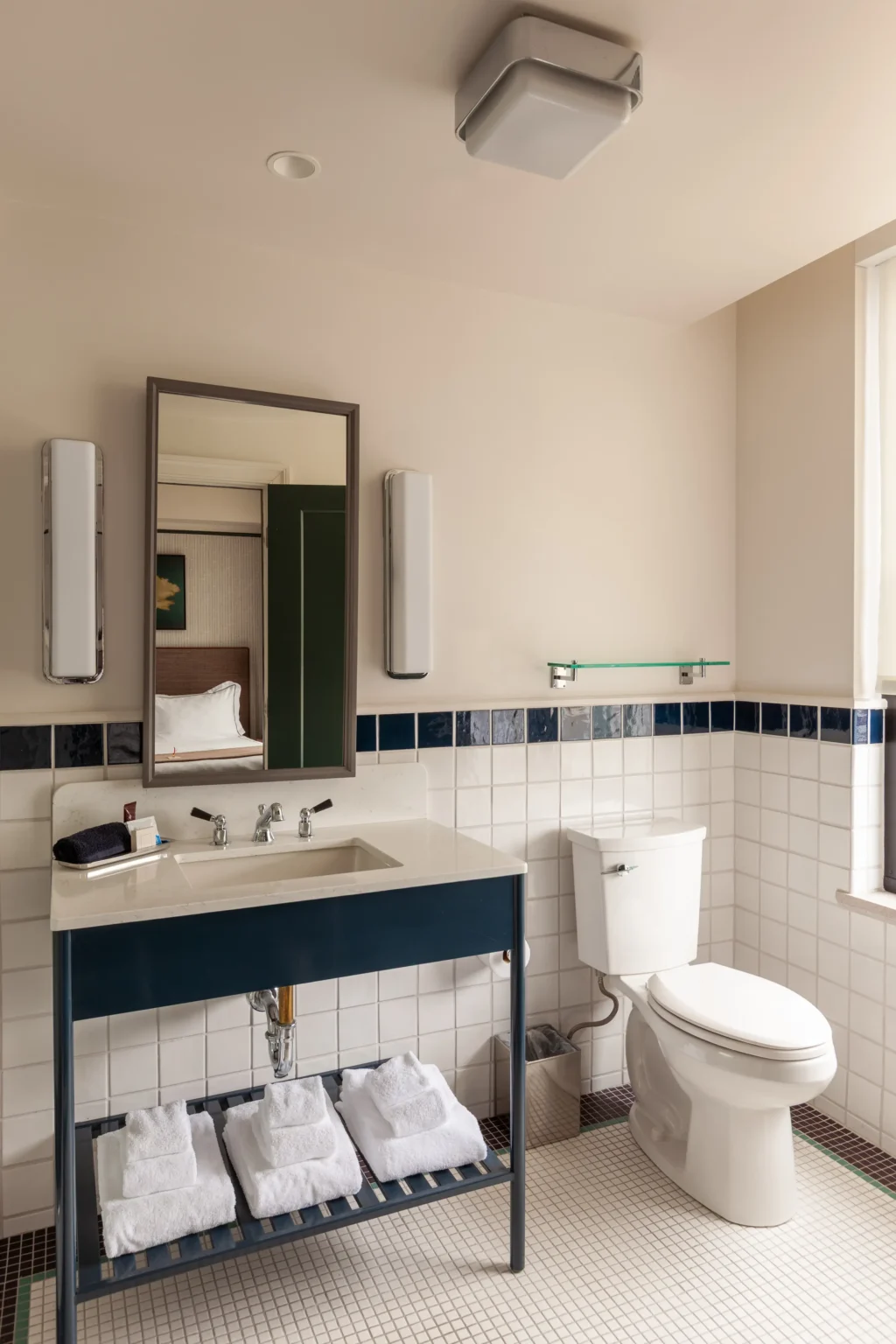 bathroom in a double queen room at the flat iron hotel