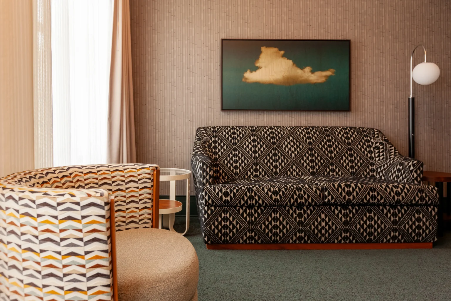 double queen suite, showing the sitting area and art work