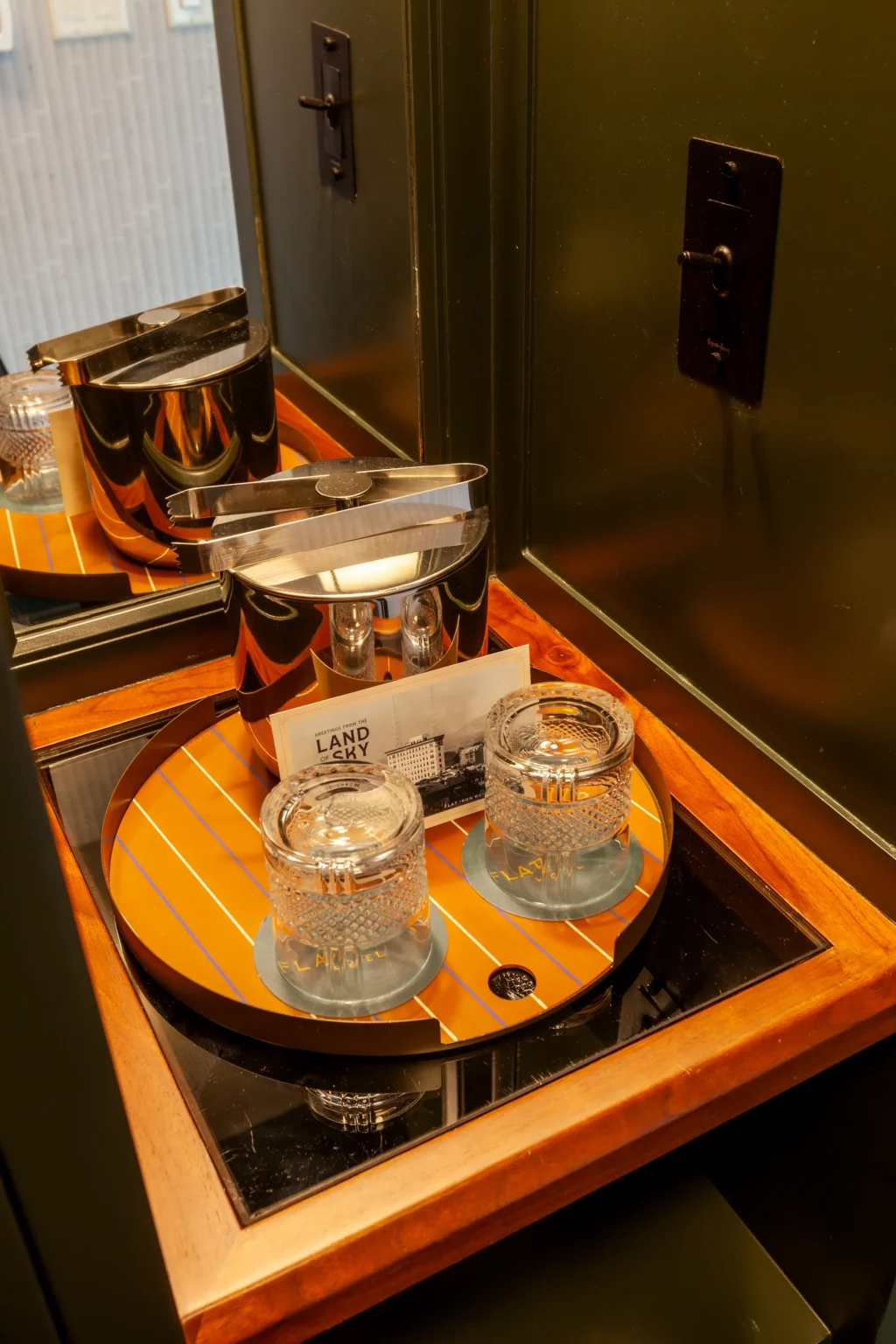 ice bucket and whiskey glass set, in a double queen suite at the flat iron hotel
