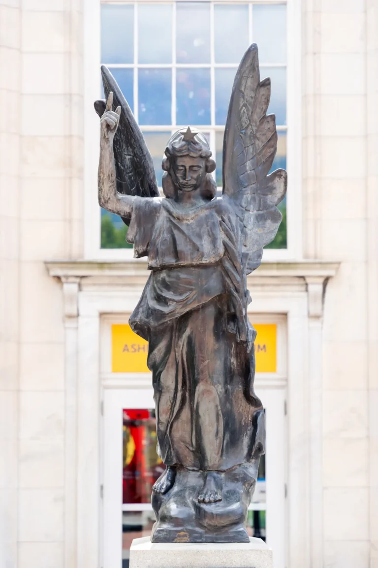 a statue of an angel outside the Asheville art musem