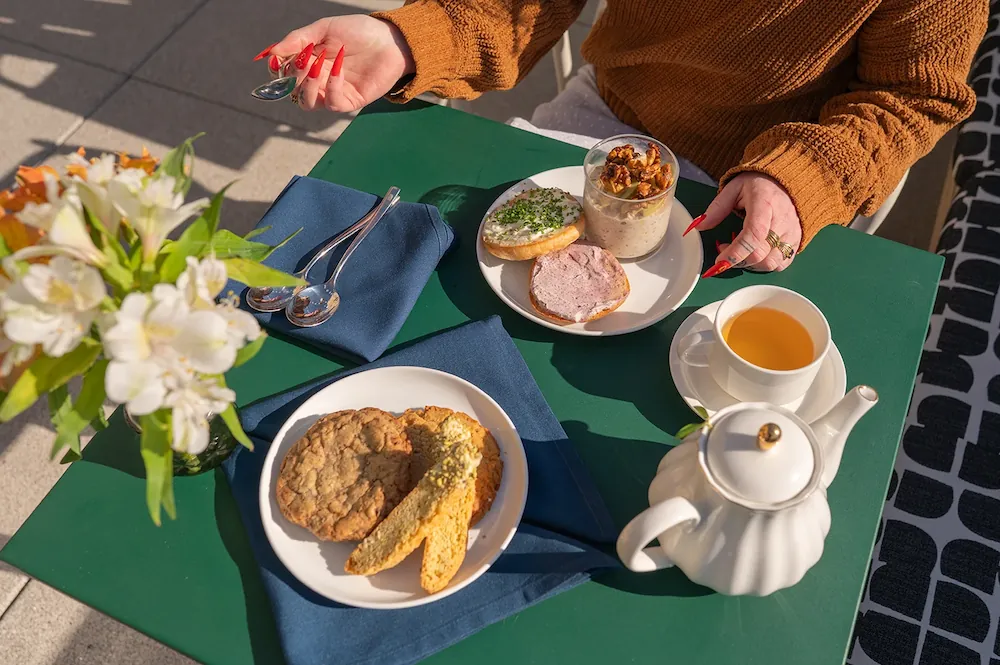 a sunlit breakfast spread at the Rooftop Caffé