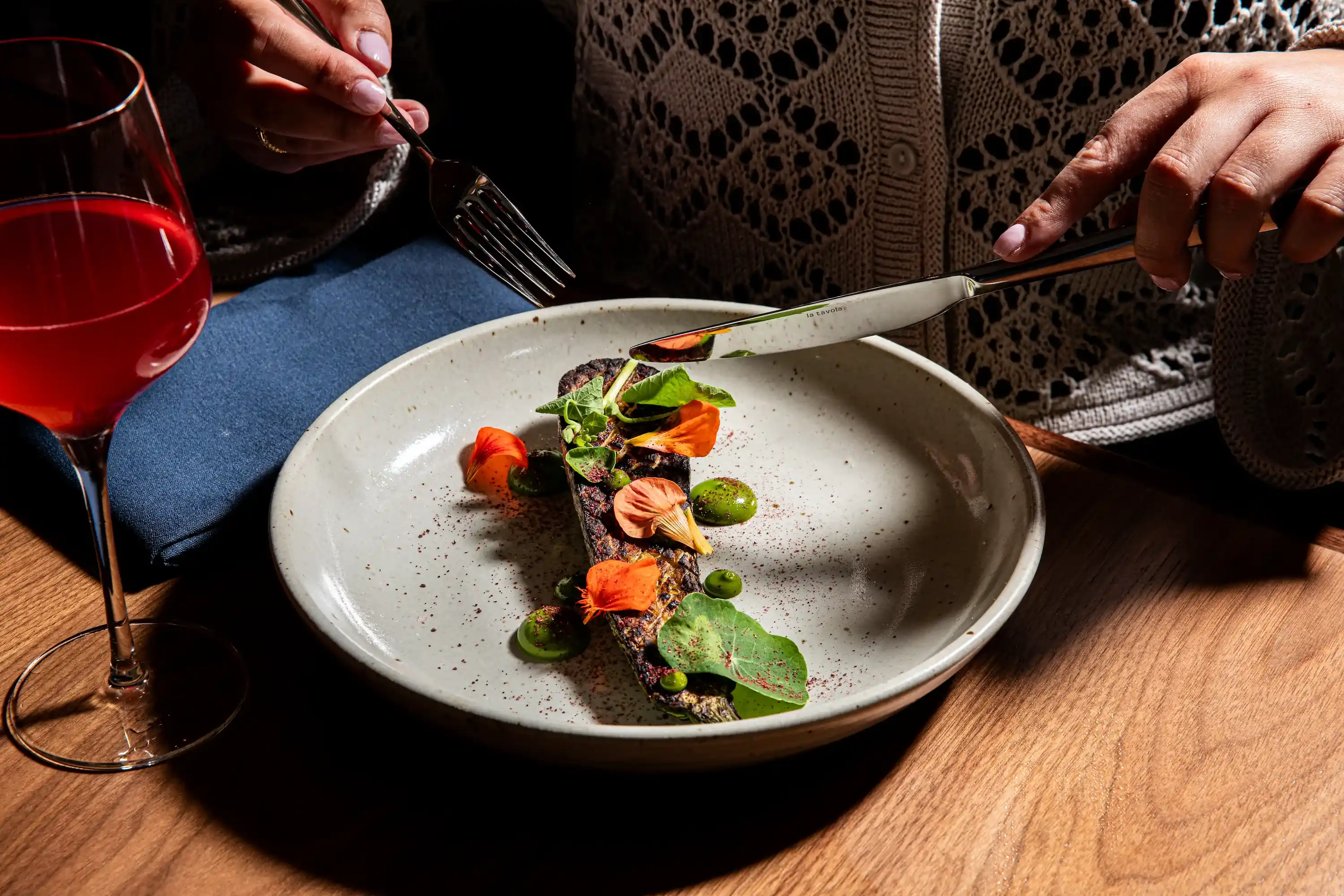 a beautifully plated grilled vegetable with wine